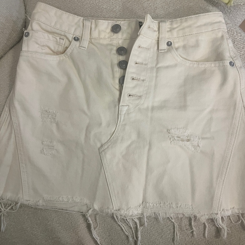 White mini skirt.